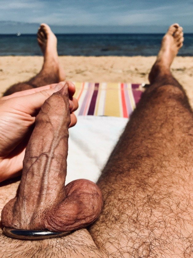 Photo by OzNudeUncut with the username @OzNudeUncut, who is a verified user, posted on May 4, 2022. The post is about the topic Veiny Cock and the text says 'In need of a hand
#uncut #nudebeach #foreskin'