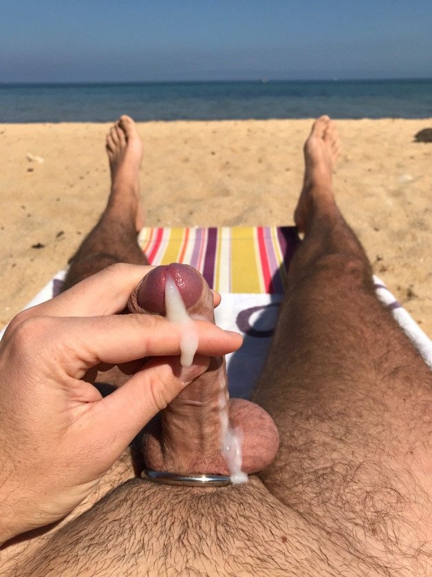 Photo by OzNudeUncut with the username @OzNudeUncut, who is a verified user,  June 19, 2022 at 8:55 PM. The post is about the topic Gay nude beach and the text says 'Spilled seed
#nudebeach #gaynudebeach #cumshot #cumming #uncut'