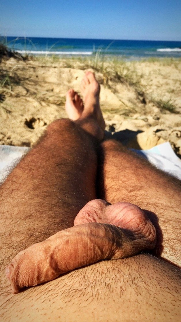 Photo by OzNudeUncut with the username @OzNudeUncut, who is a verified user,  August 6, 2022 at 1:58 PM. The post is about the topic Gay nude beach and the text says 'Deflated after a goo dedging session
#nudebach #uncut #foreskin'