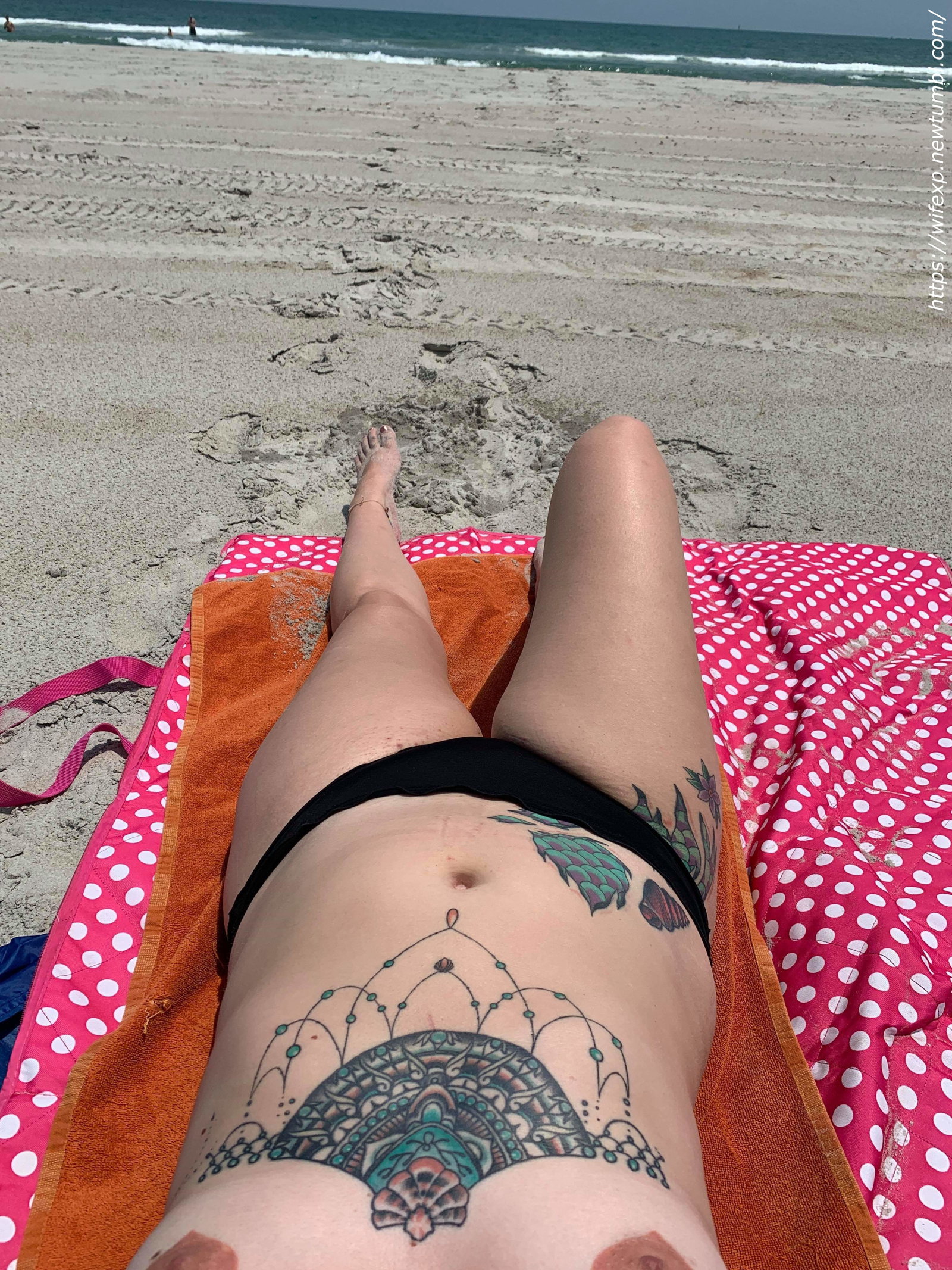 Photo by wifexp with the username @wifexp,  March 29, 2020 at 1:16 PM. The post is about the topic Amateurs and the text says 'Beautiful wife at a topless beach #wife #wifexp #amateur #homemade #selfie #tits #boobs #topless #tattoo #tattoos #NSFW'