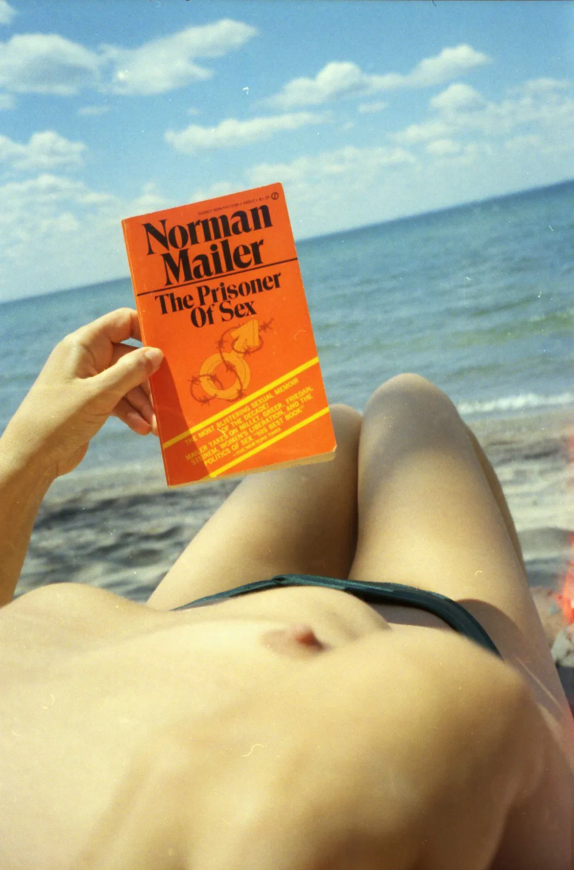 Photo by TemporaryBreak with the username @TemporaryBreak,  June 14, 2017 at 9:18 PM and the text says 'From:  upthapunx.tumblr.com #reading  #erotica  #watching  #porn  #sunbathing  #nude  #nudism  #beach  #nipple  #norman  #mailer  #the  #prisoner  #of  #sex  #submission'