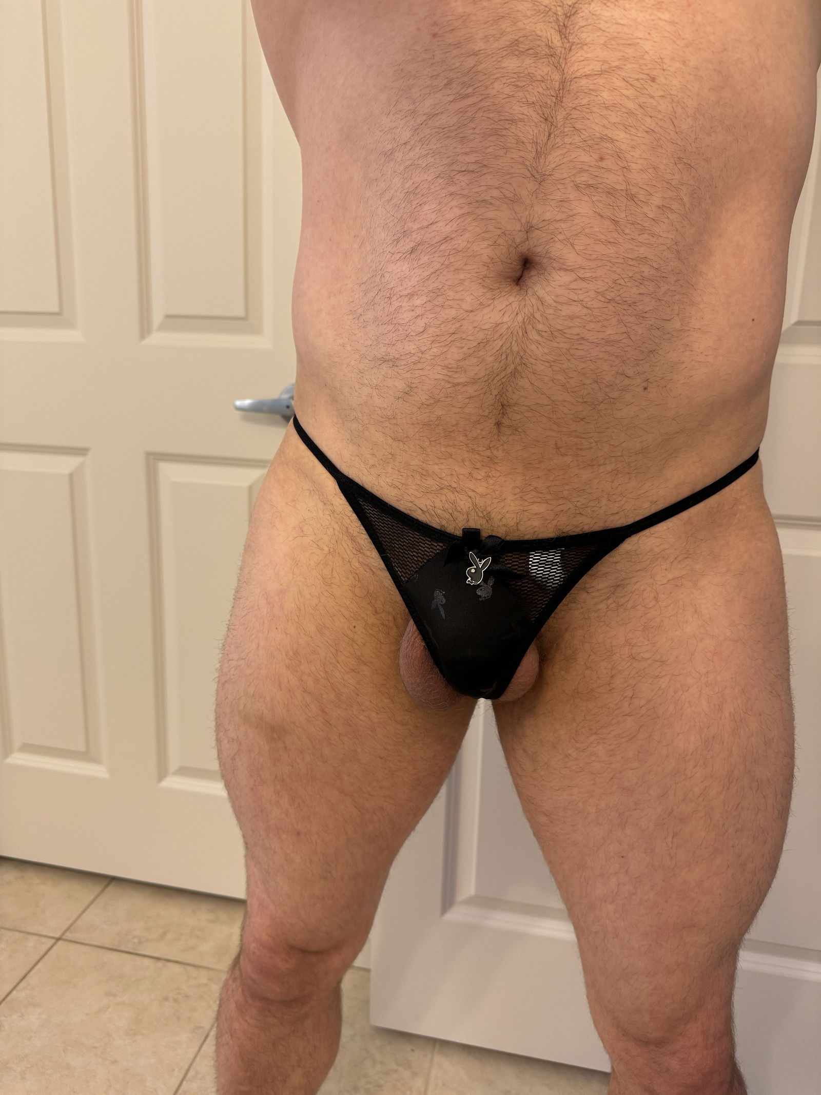 Album by Hornyguy29 with the username @Hornyguy29, who is a verified user,  June 20, 2024 at 9:02 PM. The post is about the topic Panty Bulge and the text says 'Do you prefer my wifes purple or black panties on me? #hg29'