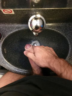 Album by Fan in Heat with the username @faninheat, who is a verified user,  December 10, 2018 at 10:18 AM and the text says 'That time I took some pics in the airplane’s restroom I ended up cumming in the sink. I think it got clogged with the slime.
#faninheat #amateur #gay #gayamateur #gayporn #cock #uncut #foreskin #cum #cumshot #jerkingoff'