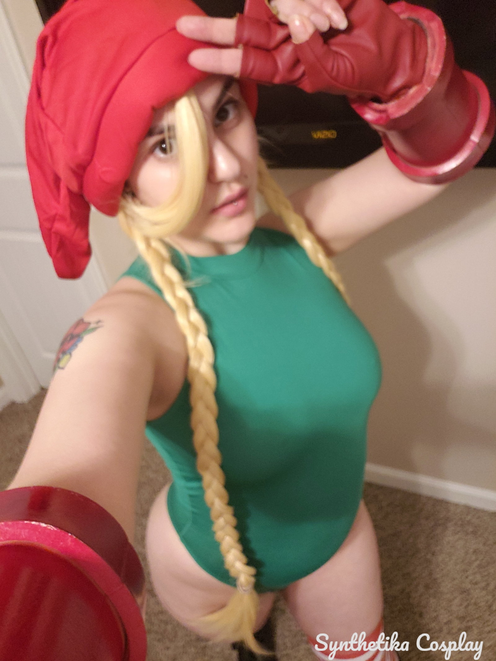 Photo by SynthetikaCosplay with the username @SynthetikaCosplay, who is a star user,  December 13, 2018 at 3:24 AM. The post is about the topic Cosplay and the text says 'Would you kiss Christmas elf Cammy underneath the mistletoe?
🍭🍭🍭🍭'