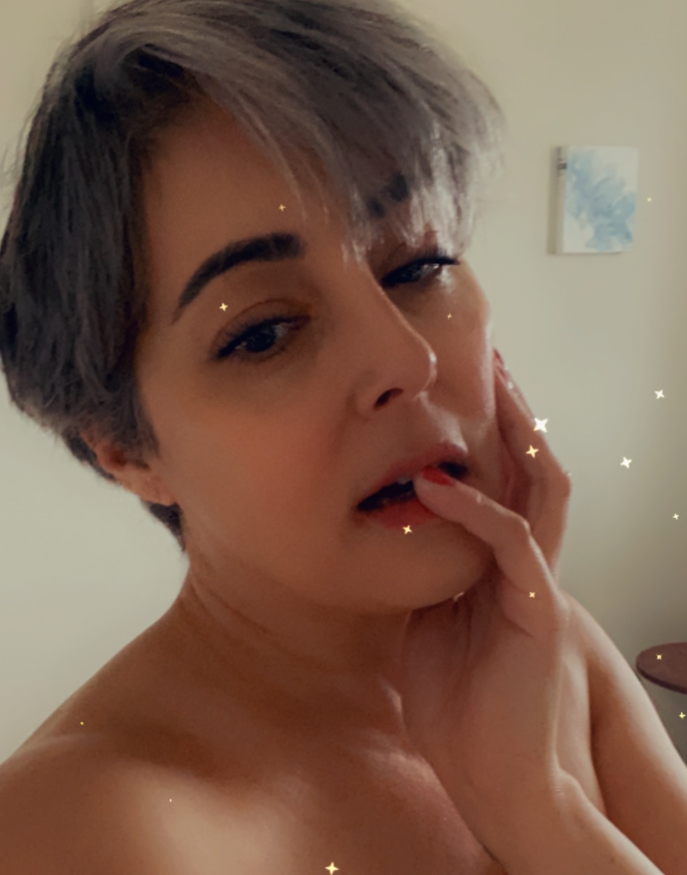 Photo by Seska with the username @seska, who is a star user,  May 19, 2020 at 4:16 PM and the text says 'Seska Lee in 2020 with short silver hair, red nails and lipstick'