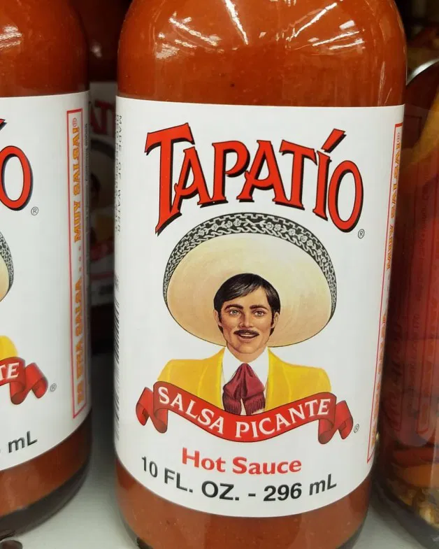 Photo by Mike Hawke with the username @wunhunglow410, who is a verified user,  August 27, 2017 at 7:48 PM and the text says 'Ok to all my Latin people out there is this brand better than say Frank&rsquo;s Red Hot sauce, I&rsquo;m thinking about getting me some. 
#tapatio #realtalk #latinculture  (at Dragon Man&rsquo;s World) #latinculture  #tapatio  #realtalk'