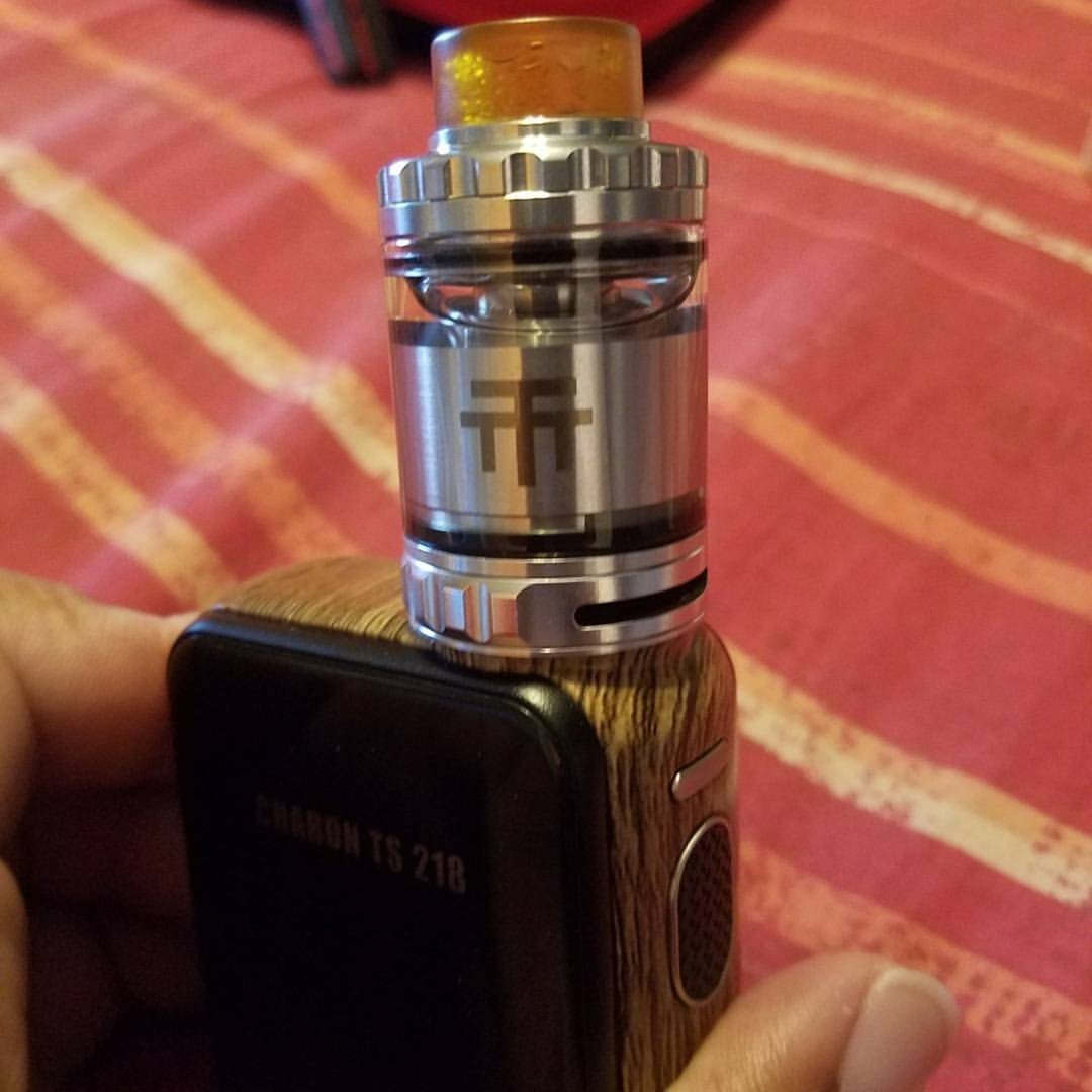 Photo by Mike Hawke with the username @wunhunglow410, who is a verified user,  October 14, 2017 at 5:12 AM and the text says 'Shout-out to @vapingwithtwisted420 for designing the @vandy_vape_official Triple 28 RTA it&rsquo;s like McDonald&rsquo;s &ldquo;I&rsquo;m loving it&rdquo; I just wished my new Smoant Charon sat it better. I&rsquo;m also loving Vandy Vape Kylin RTA in blue..'