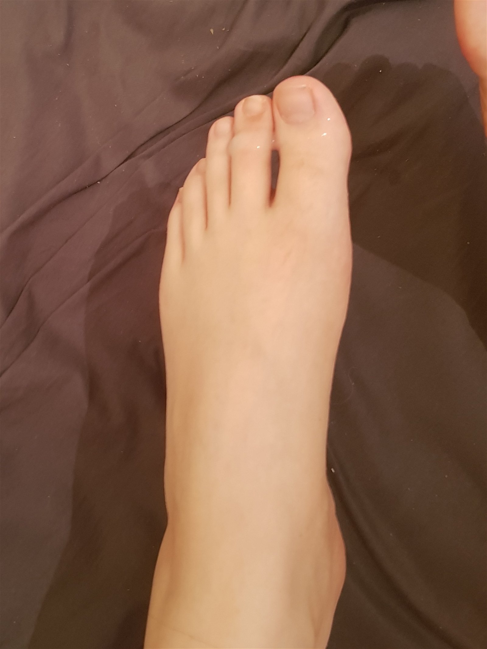 Photo by kawaiikitty42 with the username @kawaiikitty42, who is a star user,  July 4, 2020 at 12:24 AM. The post is about the topic Foot Worship and the text says 'My pretty little foot all covered in cum 💦
See more on my onlyfans'