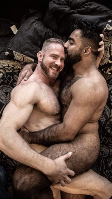 Photo by Sir Maci with the username @SirMaci,  July 28, 2020 at 12:04 PM and the text says 'Cuddlers
#hairy #muscle #beard #cuddle #love #gay #couple'