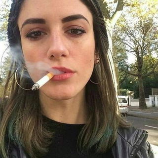 Photo by Corstophine with the username @Corstophine,  March 14, 2020 at 10:53 AM. The post is about the topic Smoking women and the text says 'A look that tells you all you need to know'