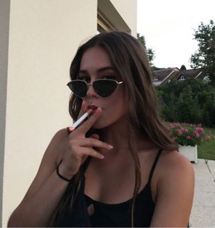 Photo by Corstophine with the username @Corstophine,  May 20, 2020 at 10:16 AM. The post is about the topic Smoking women