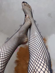 Photo by unigirlsfeet with the username @unigirlsfeet,  September 3, 2020 at 8:32 PM. The post is about the topic Caught up in fishnets and the text says 'could I catch you in my net? 

message me for content and used items (feet pics&vids, tights socks and stockings) 

or find me on IG and Twitter @unigirlsfeet'