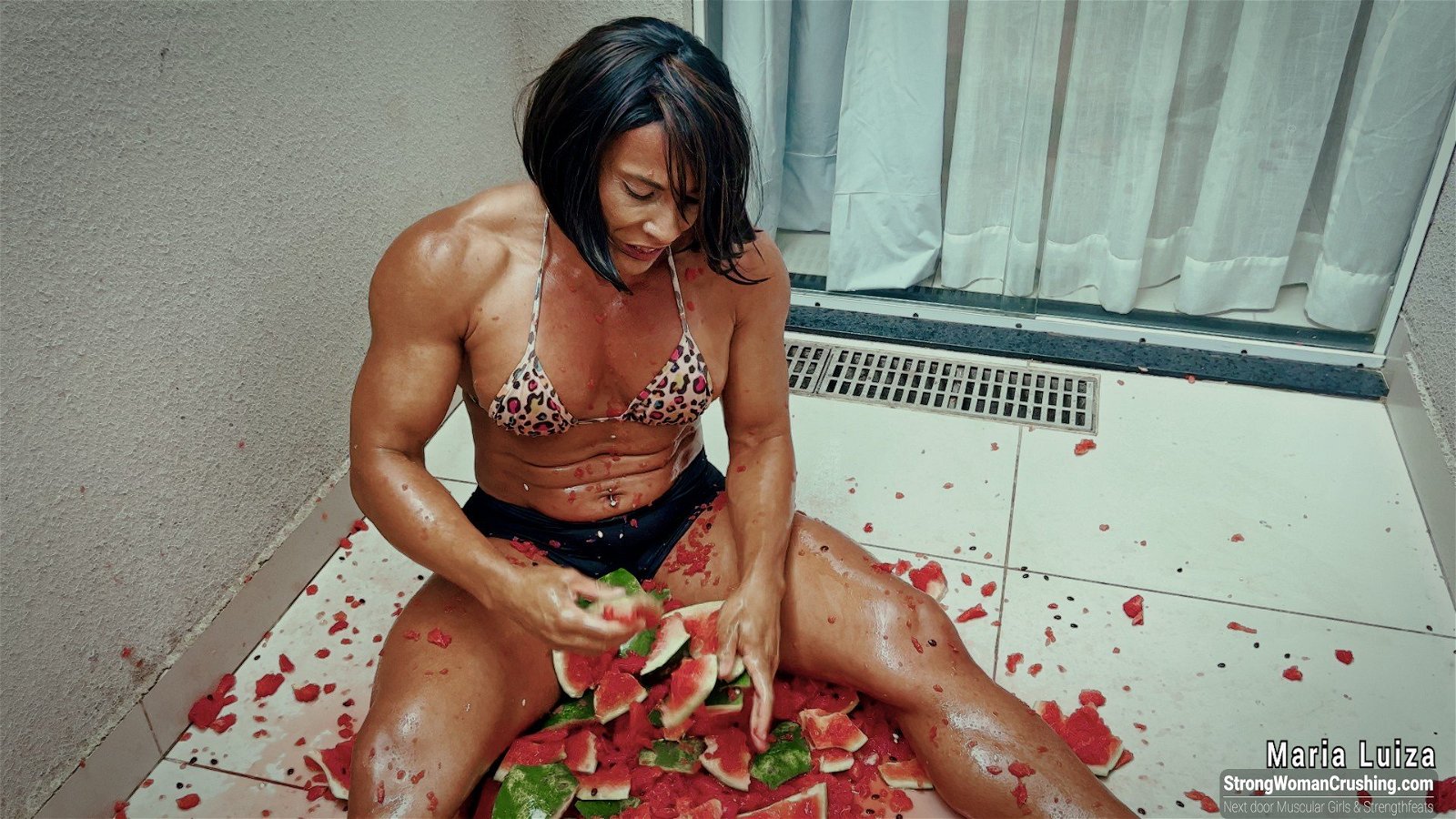 Photo by MusclegirlStrength with the username @MusclegirlStrength, who is a brand user,  July 17, 2023 at 3:51 PM and the text says '👀 Check out Maria Luiza as her incredible strength crushes a watermelon! 🍉 Get your membership now to watch the video at StrongWomanCrushing.com 🤩 #strongwoman #crush #power #watermelon #marialuiza'
