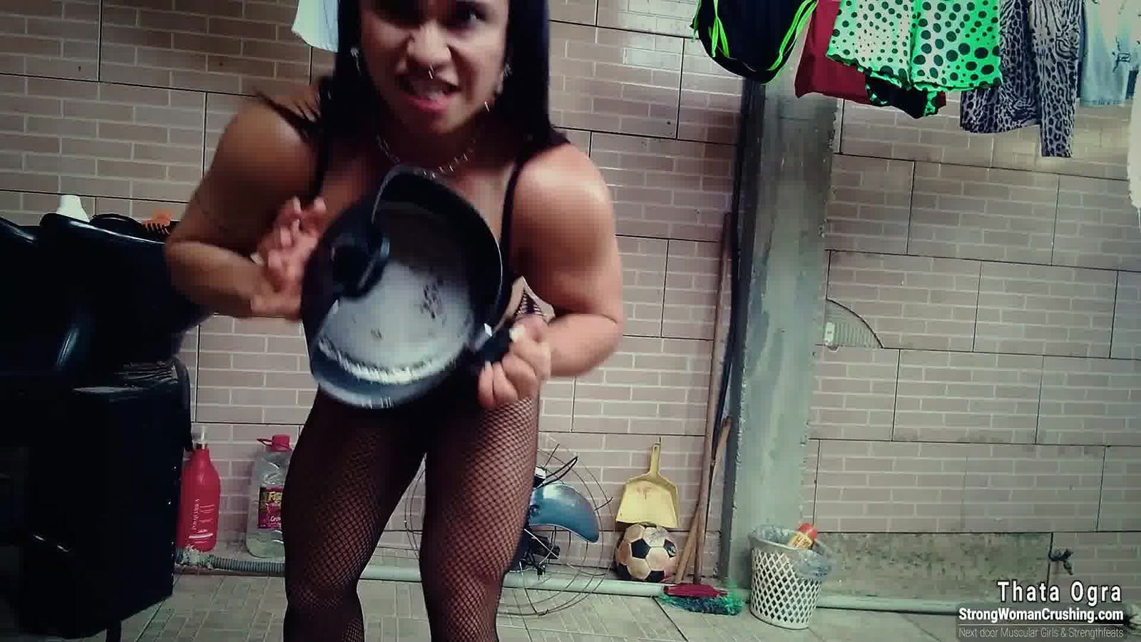 Album by MusclegirlStrength with the username @MusclegirlStrength, who is a brand user,  February 26, 2024 at 11:36 PM and the text says 'Muscle Queen Thata Ogra Smashes Iron Pan with Ease!
Full Video: https://bit.ly/35r8V9m

Indulge in the power and sensuality of muscular female bodybuilders flexing their muscles, bending metal, lifting cars, and crushing things on our site!..'