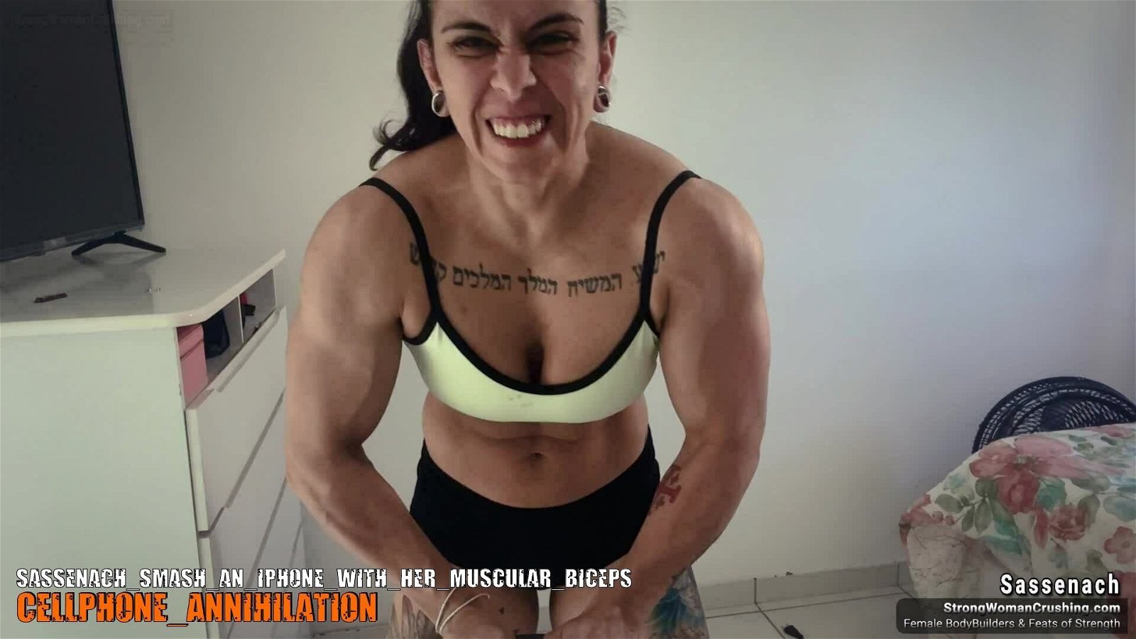 Photo by MusclegirlStrength with the username @MusclegirlStrength, who is a brand user,  September 6, 2023 at 3:05 PM and the text says 'Smash that iPhone 👊 with Sassenach's Muscular Biceps! 💪 Get your membership now to watch this amazingly strong woman 💪🏼💥 at www.strongwomancrushing.com 🌐 #StrongWomen #Sassenach #Biceps #CrushingGoals #PowerfulWoman'