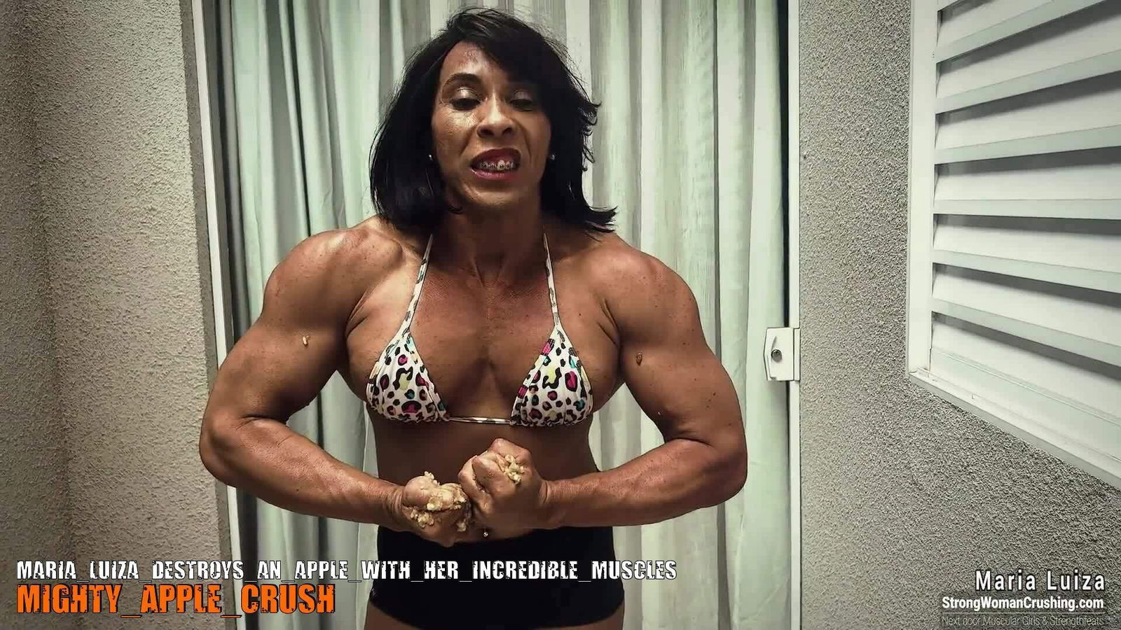 Album by MusclegirlStrength with the username @MusclegirlStrength, who is a brand user,  September 25, 2023 at 4:29 AM and the text says '💪🏼 Check out Maria Luiza crushing an apple with her incredible muscles! 🍎 Visit www.strongwomancrushing.com to get a membership and watch the video 🤩 #marialuiza #strongwoman #crushing #apple #incrediblemuscles'