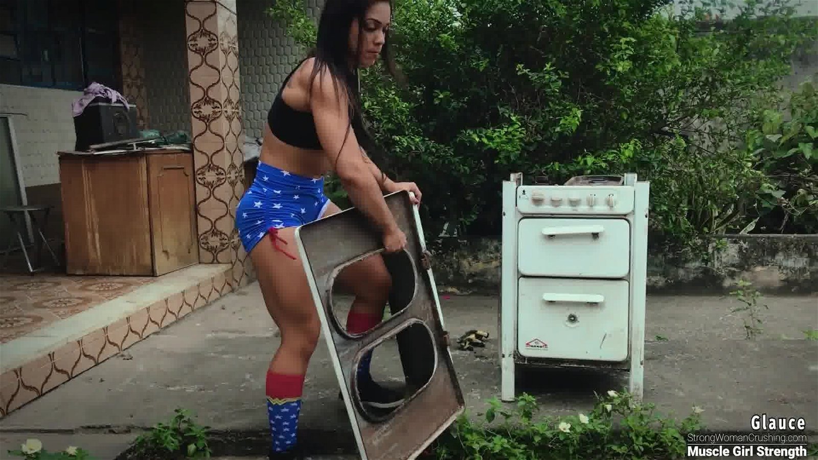 Photo by MusclegirlStrength with the username @MusclegirlStrength, who is a brand user,  January 5, 2024 at 8:21 PM and the text says 'Muscle Goddess vs. Fiery Inferno: Epic Halloween Stove Demolition!
Link:  https://bit.ly/3FN9IxC

Double tap if you are ready to witness the power of Glauce 💪💥 Join our monthly membership starting at 8.99 and indulge in the mesmerizing world of..'