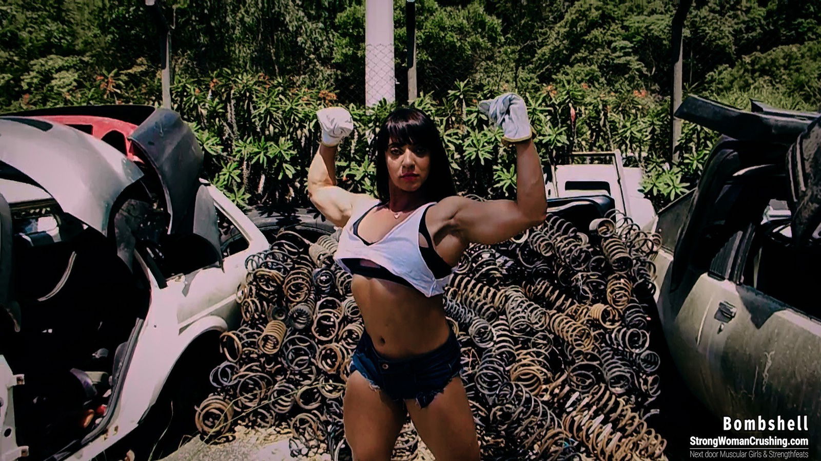 Album by MusclegirlStrength with the username @MusclegirlStrength, who is a brand user,  July 18, 2023 at 6:42 PM and the text says '#StrongWoman #BombshellCrushing #LiftingCars #ScrapyardLift #PowerLifting 💪🏼 Check out this video of Bombshell lifting a car in a scrapyard! Get your membership now to watch the whole thing at StrongWomanCrushing.com 💪🏼'