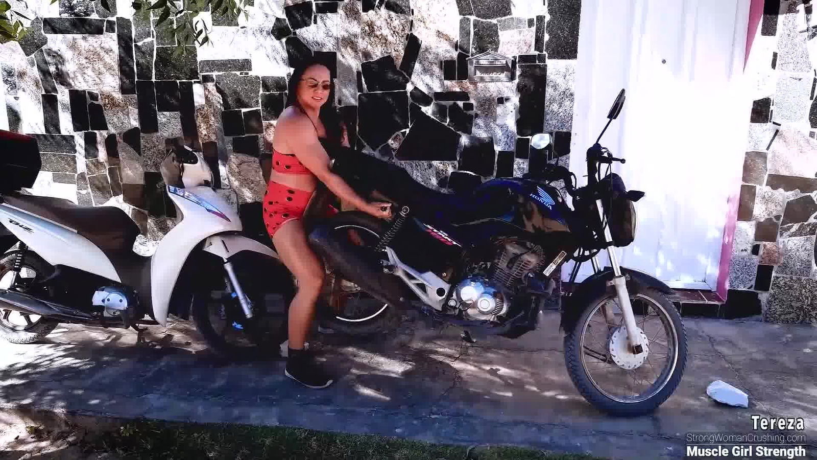 Album by MusclegirlStrength with the username @MusclegirlStrength, who is a brand user,  February 28, 2024 at 5:17 PM and the text says 'Unbelievable Strength: Tereza Lifts Motorcycle and Scooter!
Full Video: https://bit.ly/3y7A4bB

Experience the sheer power and sensuality of muscular female bodybuilders showcasing their strength through jaw-dropping feats - from lifting cars to..'