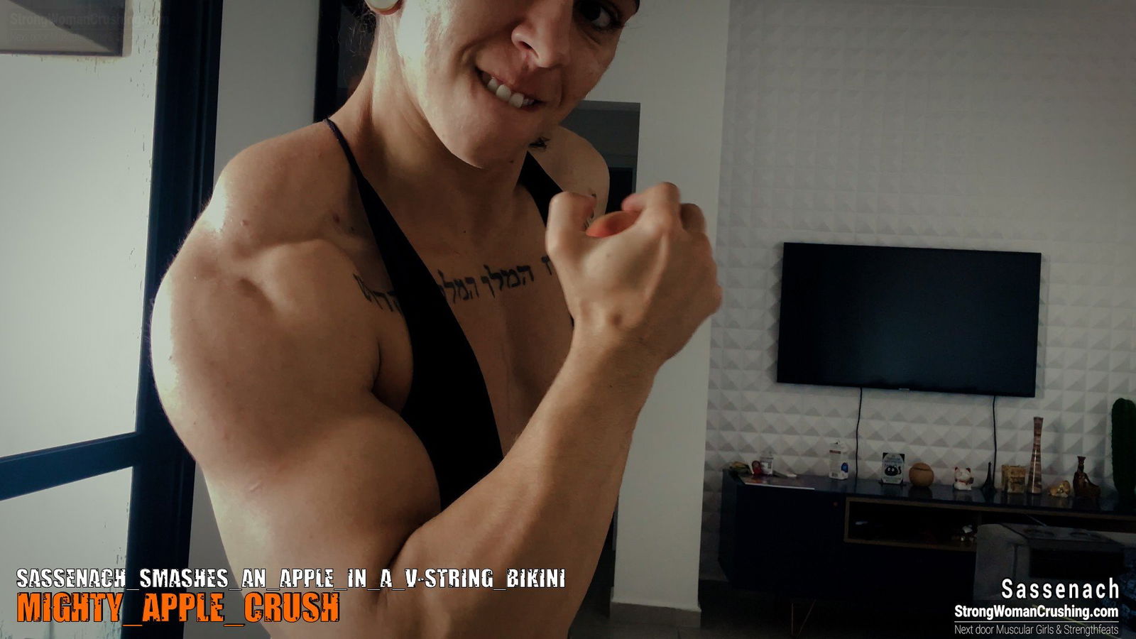 Album by MusclegirlStrength with the username @MusclegirlStrength, who is a brand user,  October 13, 2023 at 1:55 PM and the text says '🔥 Ready for jaw-dropping strength? 🔥

💪 Watch u/Sassenach crush an apple in a V-string bikini! 💪

🎥 Click the link below to witness her power! 🎥

🌟 Get a membership at www.strongwomancrushing.com 🌟

#MuscularWomen #FeatsOfStrength..'