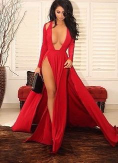 Photo by Tinuus34 with the username @Tinuus34, who is a verified user,  October 2, 2020 at 10:35 PM. The post is about the topic Seductive glamour and the text says 'The lady in red invite to fun all around #busty #slit #seductiveglamour #glamour #whatadress'