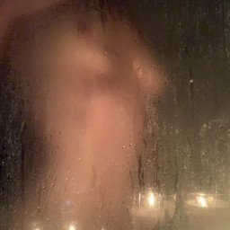 Photo by Canuckcouple with the username @Canuckcouple, who is a verified user,  October 9, 2022 at 12:35 PM. The post is about the topic MILF and the text says 'showering by candlelight this morning 🕯
want to join me? 🔥💦😙'