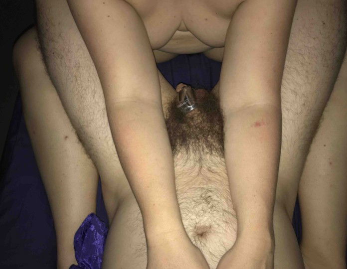 Photo by UnsatisfiedDom with the username @UnsatisfiedDom, posted on September 24, 2020. The post is about the topic Real Couples and the text says 'I like to tease him by getting close to his locked up little clit dick.'