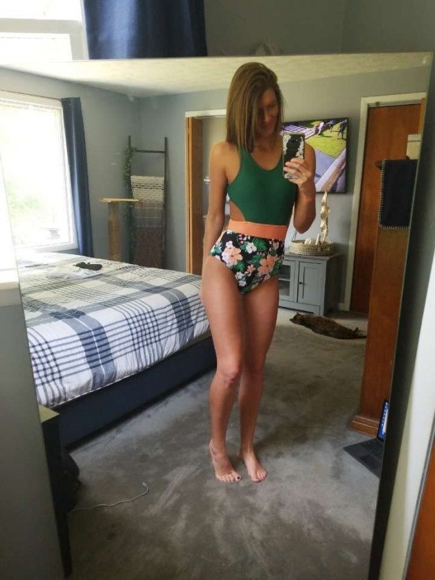 Album by SoccerMom88 with the username @SoccerMom88, who is a star user,  May 23, 2021 at 3:30 PM and the text says 'trying on my new bathing suit..whatcha think?'