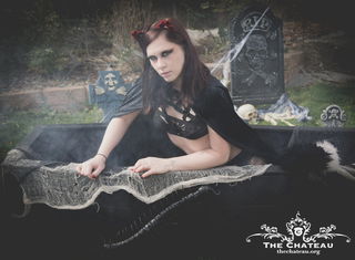 Photo by sunnykittenmeow with the username @sunnykittenmeow,  October 8, 2020 at 7:16 AM and the text says 'Vampurr in the Graveyard 📸 BlairCraft AfterDark 2018 ⚰️ thechateau.org'