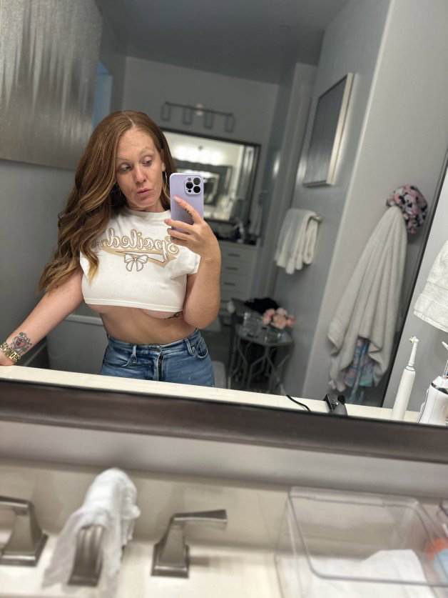 Photo by Mrs. Exxtraa with the username @Redheadgoddess, who is a star user,  June 10, 2024 at 8:55 PM and the text says 'Me + Crop Tops = ❤️'