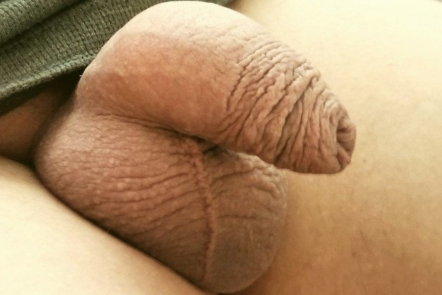 Photo by the foreskin is good with the username @theforeskinisgood, who is a verified user,  January 22, 2022 at 6:38 PM. The post is about the topic the foreskin is good for the penis and the text says 'Just hanging1 out. View from the left side. With amazing scrotal seam'