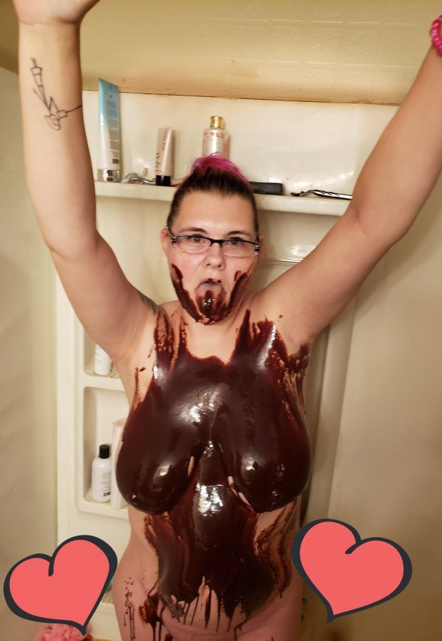 Photo by Fenrir with the username @thor2347, who is a verified user,  August 10, 2021 at 4:49 AM. The post is about the topic MILF and the text says 'The weather wouldn't cooperate so our outdoor pictures didnt end up happening. We decided to have fun with some chocolate instead'