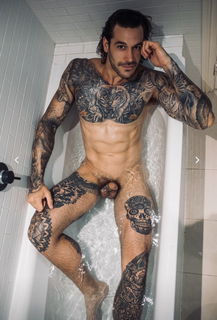 Album by LeFoutre with the username @LeFoutre,  October 31, 2020 at 6:57 PM. The post is about the topic Tattooed Naked Men and the text says 'This guy ... 😍'