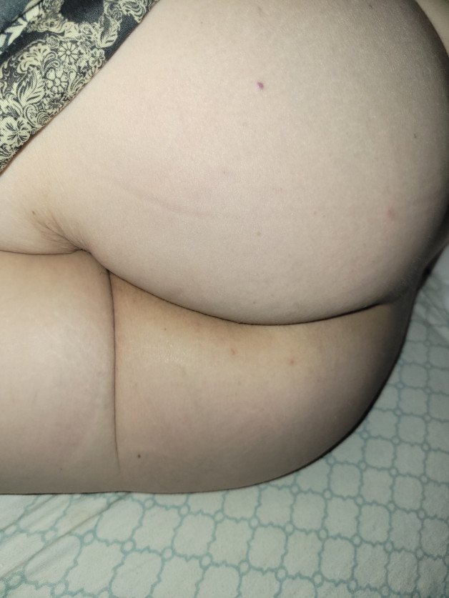 Album by Thickwifeofmine with the username @Blackrock85, who is a verified user,  May 12, 2021 at 4:18 AM. The post is about the topic Amateurs and the text says '#wifesass #thicc #booty #sleepingbooty'