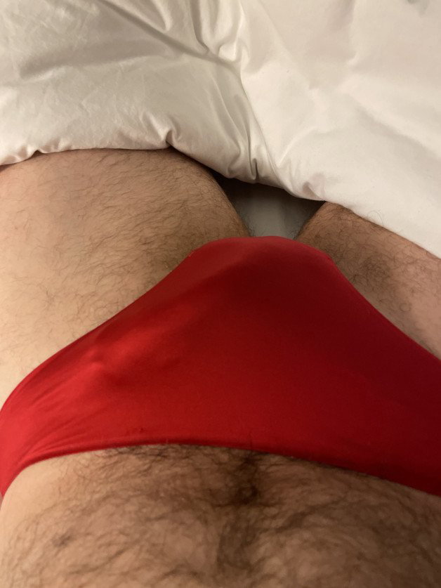 Photo by Dicksinlace with the username @Dicksinlace,  February 22, 2023 at 10:17 PM. The post is about the topic Panty Bulge and the text says 'Happy belated Valentines day. wearing my red panties to mark the occasion. 
#dicksinlace #cd #pantybulge #crossdress'