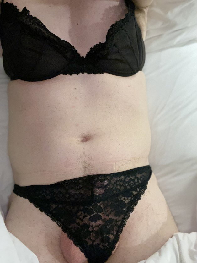 Photo by Dicksinlace with the username @Dicksinlace,  August 4, 2021 at 2:26 AM. The post is about the topic Crossdressers and the text says 'I'm so excited. I got new panties, and when I was in a hotel room last week, I found a matching black bra under the drawer in the dresser! It's so hot to imagine what the previous owner looked like in it. Anyway, here's a picture of me in it with my new..'