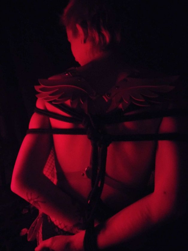 Album by trophytheythem with the username @trophytheythem,  February 16, 2021 at 2:52 PM. The post is about the topic Non-Binary Exhibition and the text says 'my first time getting tied up for the camera ❣️'