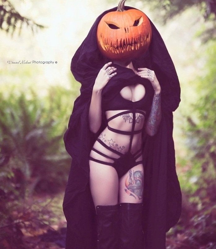 Photo by earlgreyatmidnight with the username @earlgreyatmidnight,  October 11, 2018 at 5:52 PM and the text says 'This is Halloweenrii.ni #tattoo  #tattoos  #girls  #with  #tattoos  #ink  #inked  #inked  #babes  #lingerie  #halloween  #jack  #o  #lantern  #pumpkin  #fall  #autumn  #women  #with  #tattoos  #spooky  #scary'