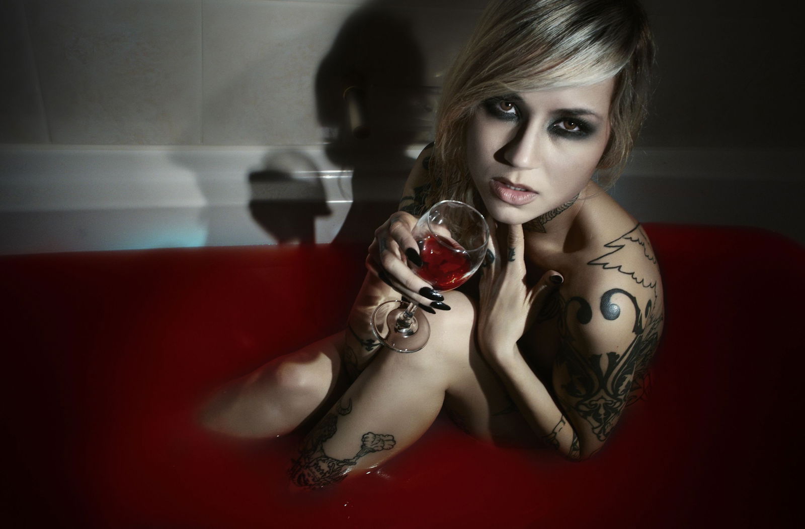 Photo by earlgreyatmidnight with the username @earlgreyatmidnight,  October 4, 2018 at 7:58 PM and the text says 'She’s out for bloodSara FabelIG: sarafabel #Sara  #fabel  #tattoo  #tattoos  #ink  #inked  #inked  #babes  #girls  #with  #tattoos  #halloween  #sexy  #wine  #blood  #model'